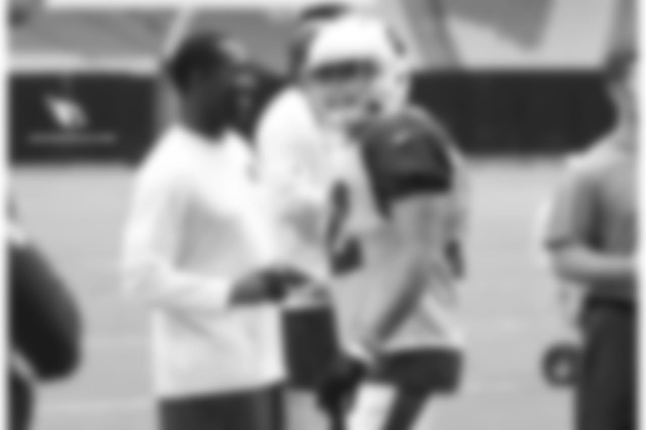 S Tyrann Mathieu shakes hands with assistant special teams coach Anthony Blevins after breaking up a screen play