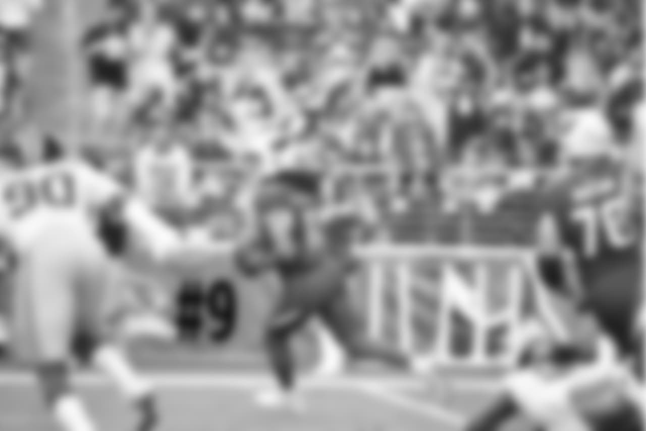 WR Larry Fitzgerald prepares to throw a pass