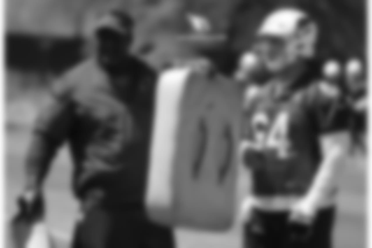 OL coach Ray Brown (left) and G/C Mason Cole