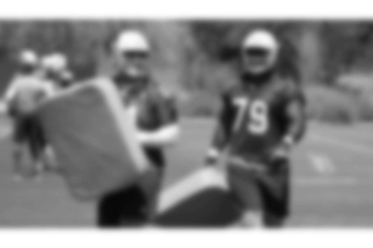OL Mason Cole and Korey Cunningham