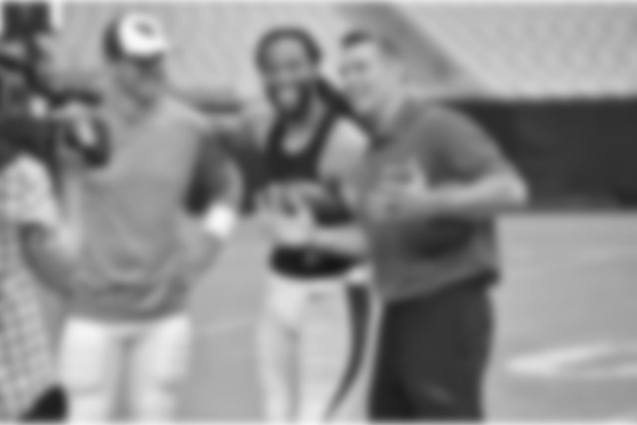 Working with NFL Network, Warner visits Larry Fitzgerald and Carson Palmer during 2014 training camp at University of Phoenix Stadium