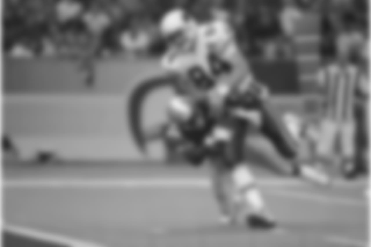 1998: TE Chris Gedney scores a touchdown on Seattle's Fred Thomas