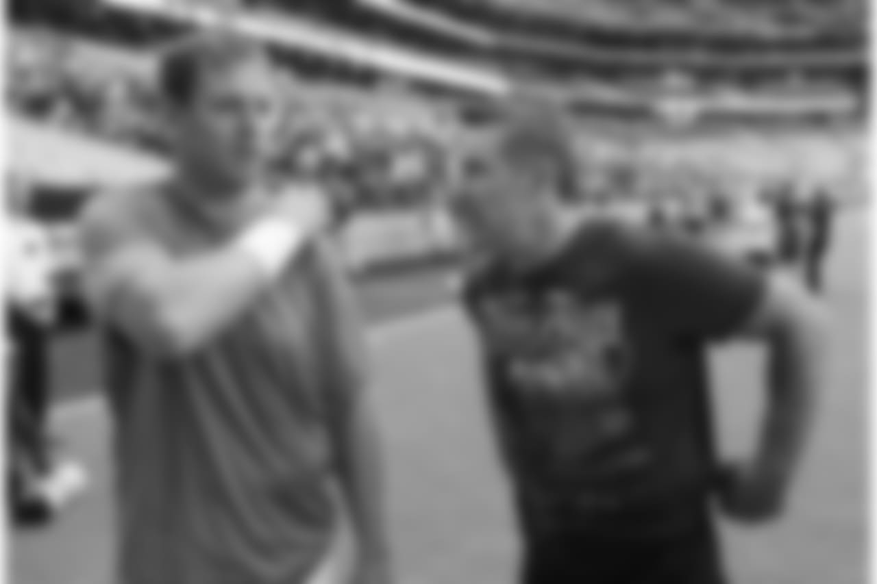 With Kurt Warner at training camp in 2013