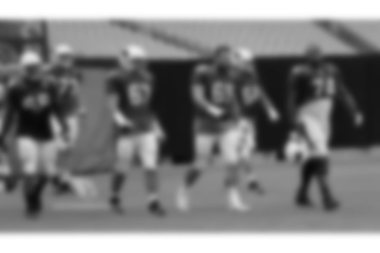 The offensive line comes on to the field.