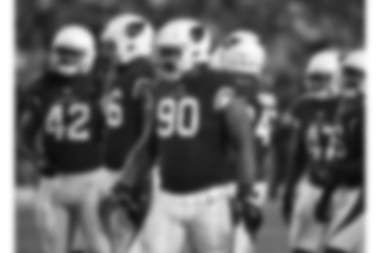 DT Robert Nkemdiche and the defense prepare for the snap