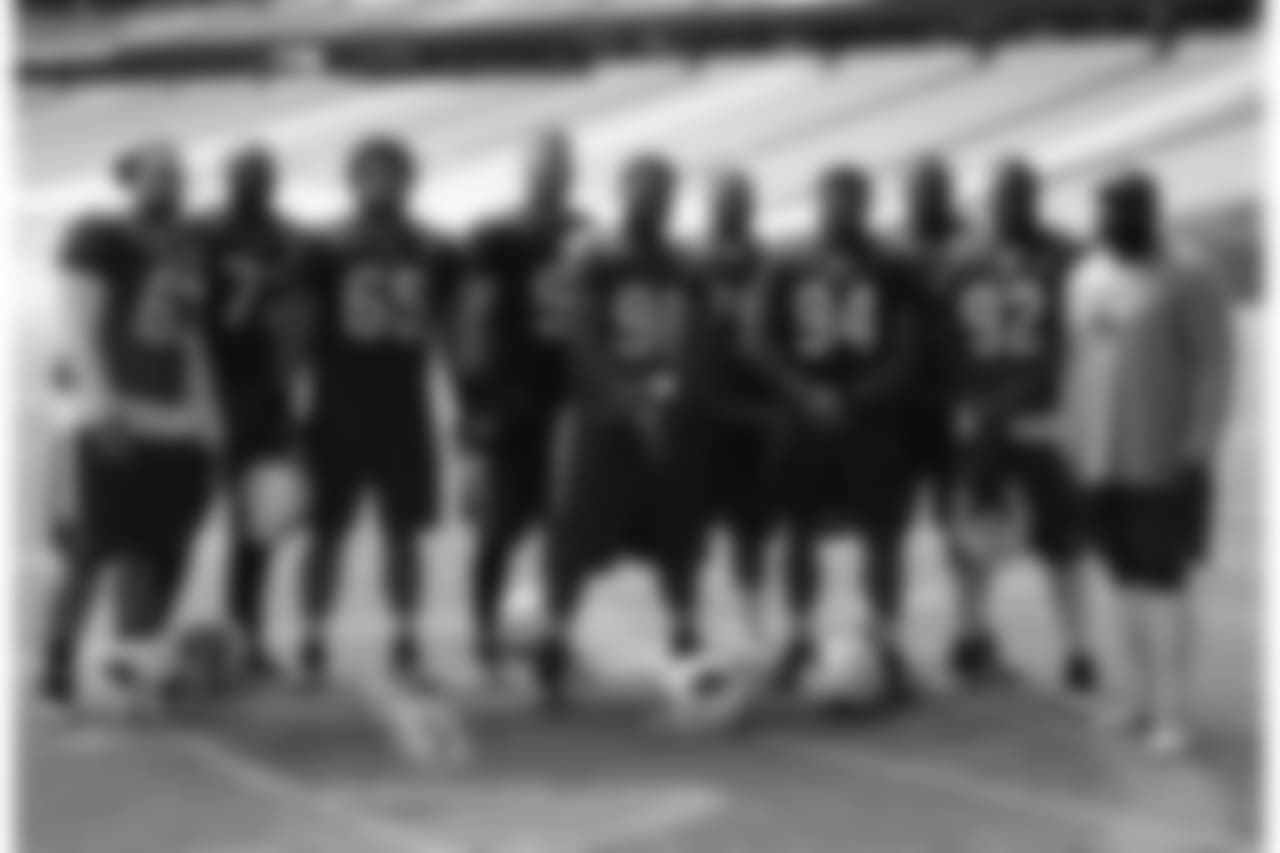 The defensive line (from left): Peli Anau, Olsen Pierre, Pasoni Tasini, Josh Mauro, Corey Peters, David Moala, Xavier Williams, Rodney Gunter, Frostee Rucker, coach Brentson Buckner