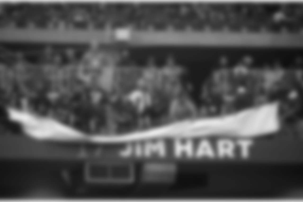 Former Cardinals quarterback Jim Hart joins the Ring of Honor during a ceremony at halftime