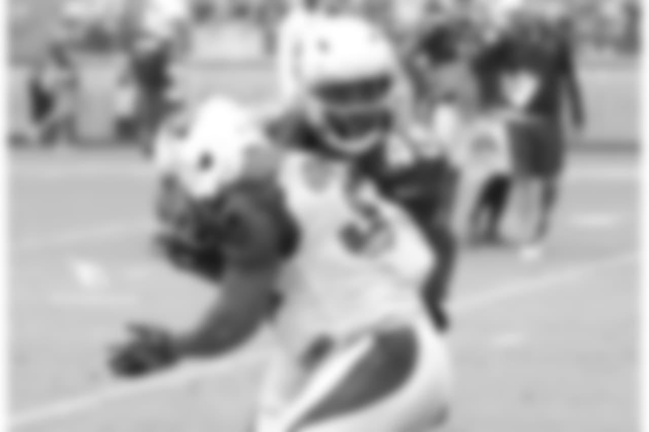 RB James Summers absorbs a hit from CB Jarell Carter