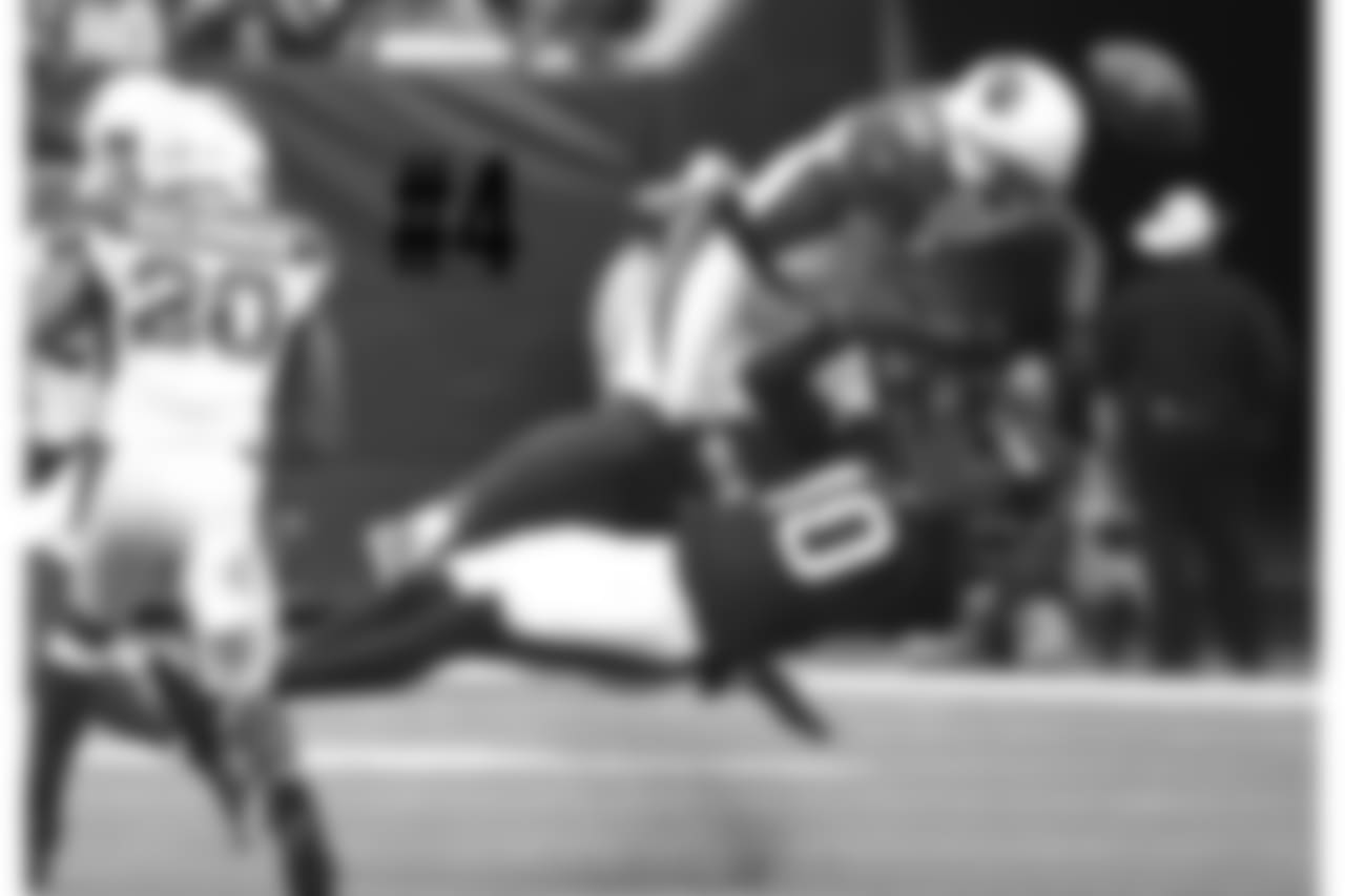 S Antoine Bethea (top) collides with Texans WR DeAndre Hopkins