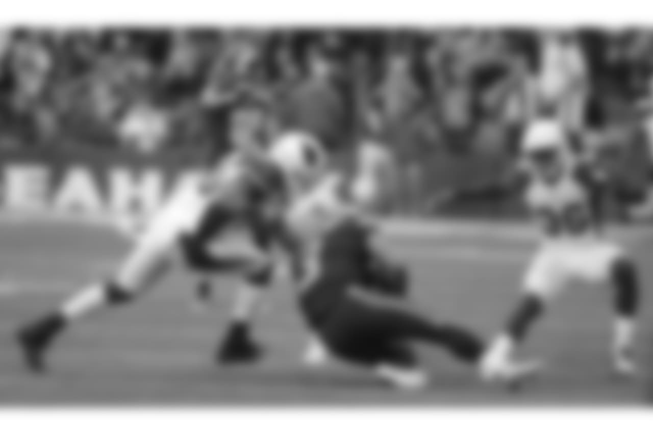 Seahawks QB Russell Wilson slides
