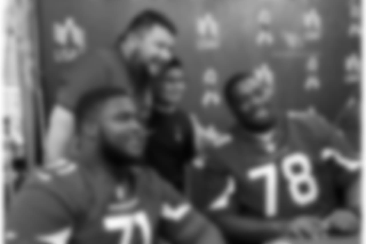G Kaleb Johnson (left) and T Givens Price pose for a photo with fans