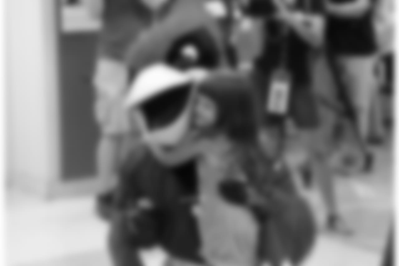 Big Red hugging a young fan