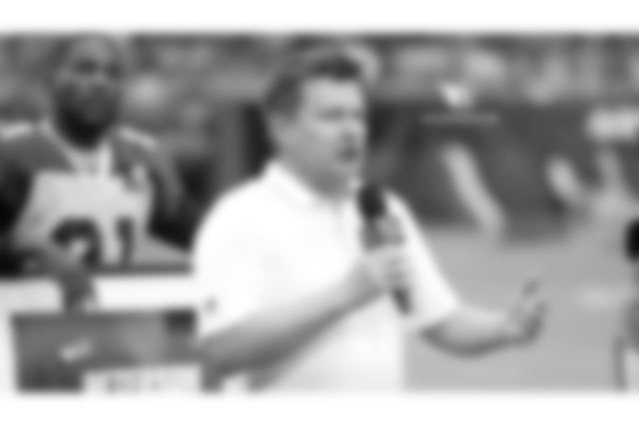 Team president Michael Bidwill talks to the crowd