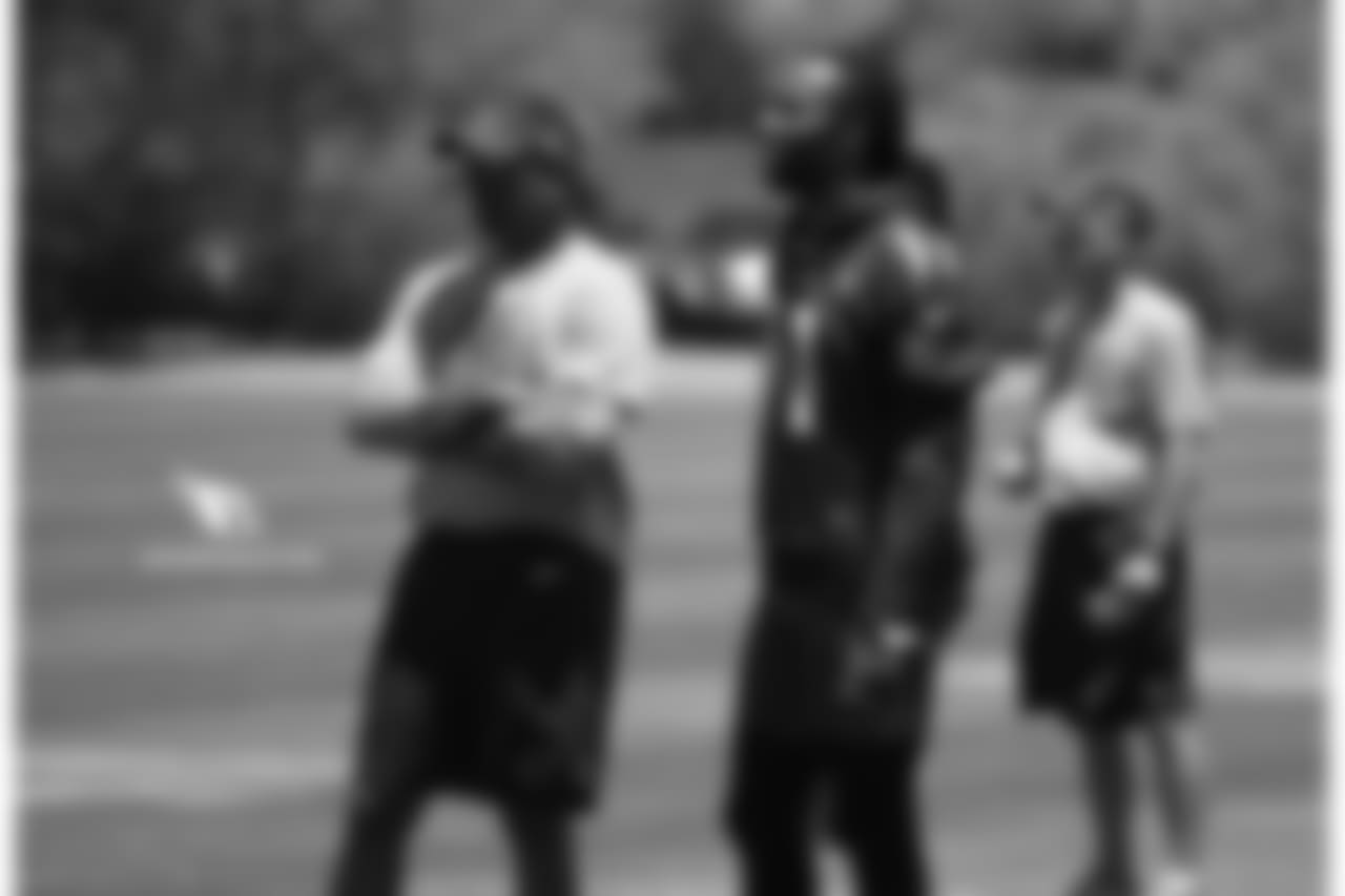 Coach Steve Wilks (left) and WR Larry Fitzgerald