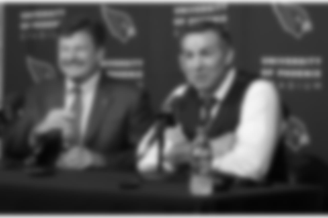 Kurt Warner (right) draws a laugh from team president Michael Bidwill during the press conference to announce Warner going into the franchise's Ring of Honor