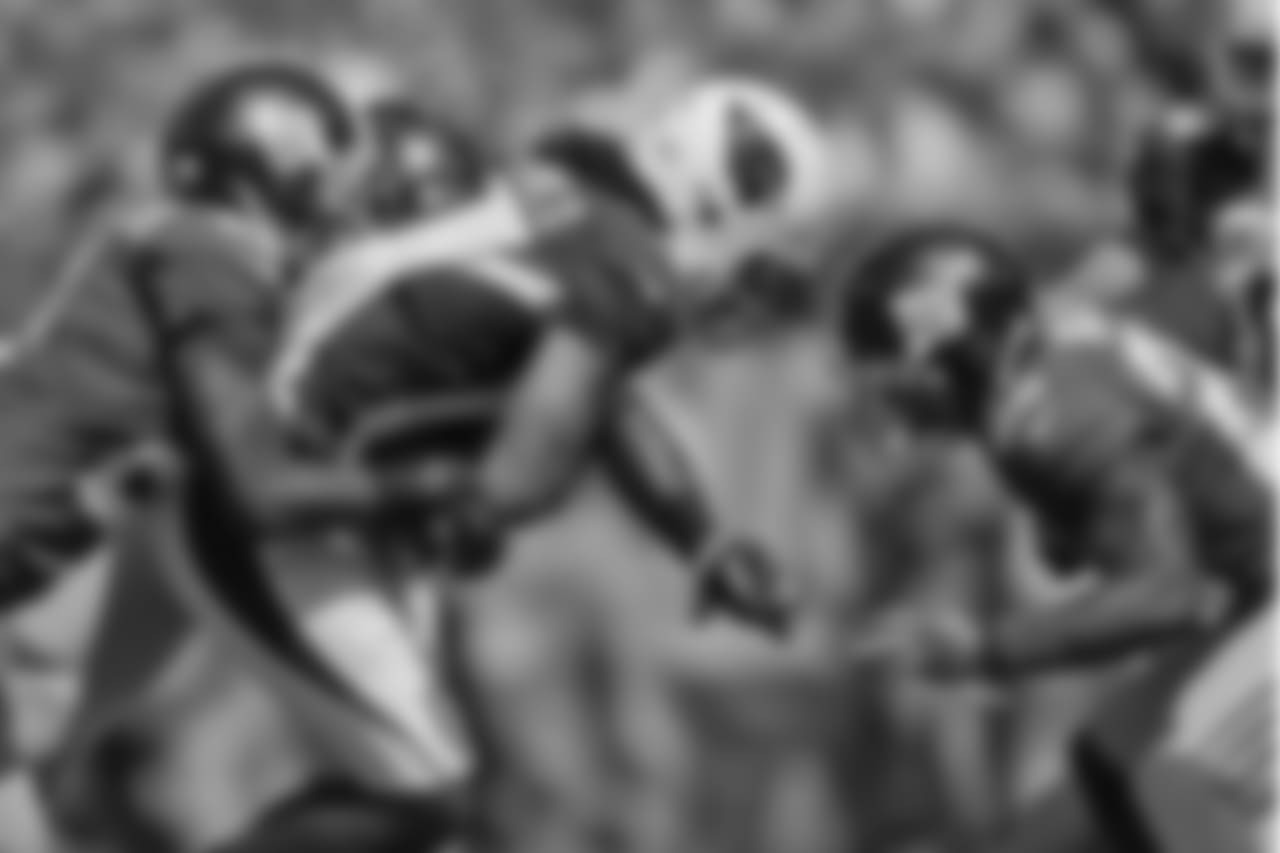 2014: WR Larry Fitzgerald fights for yardage