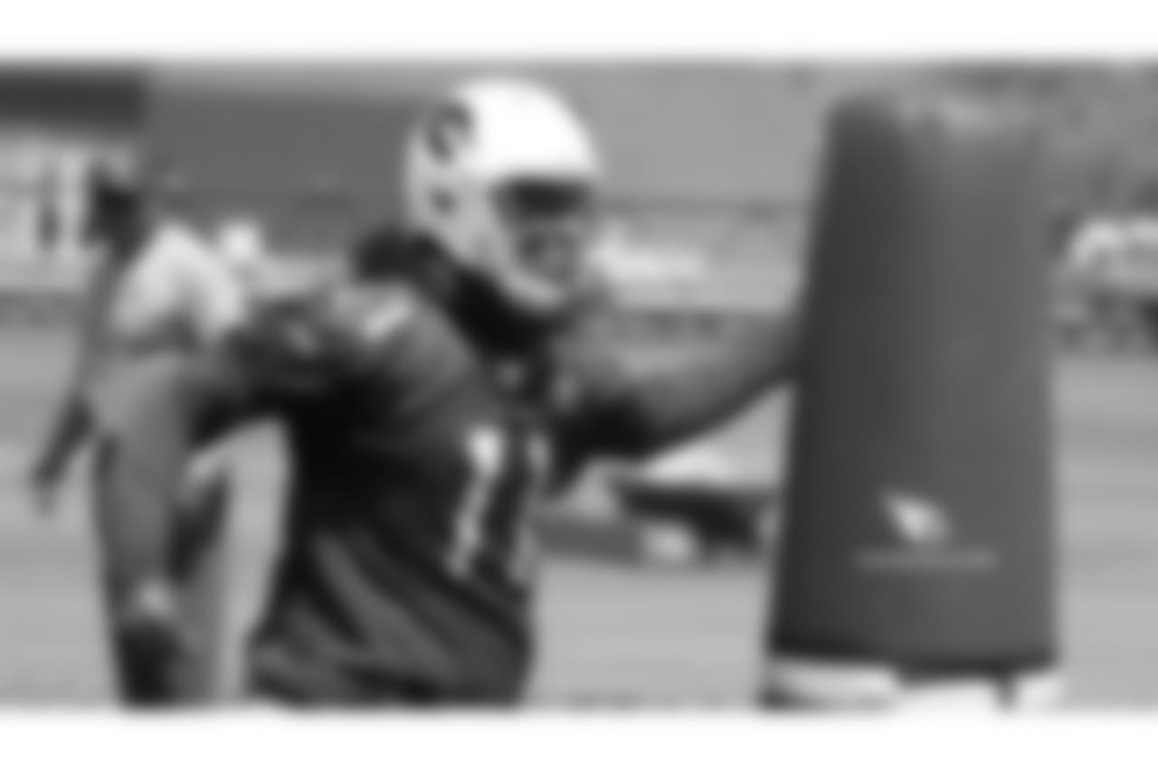WR Larry Fitzgerald going through a defensive line drill