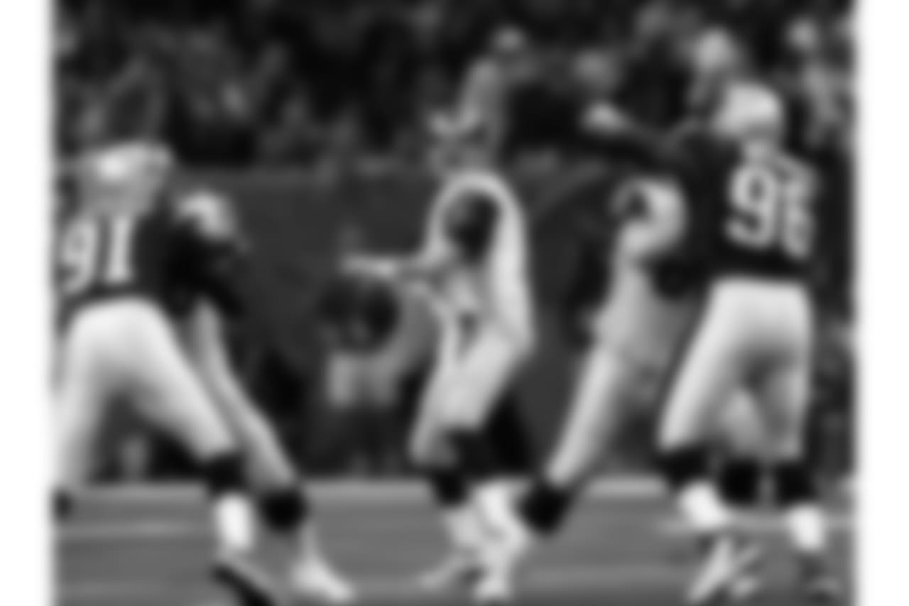 Playing for the Rams against the Patriots in Super Bowl XXXVI