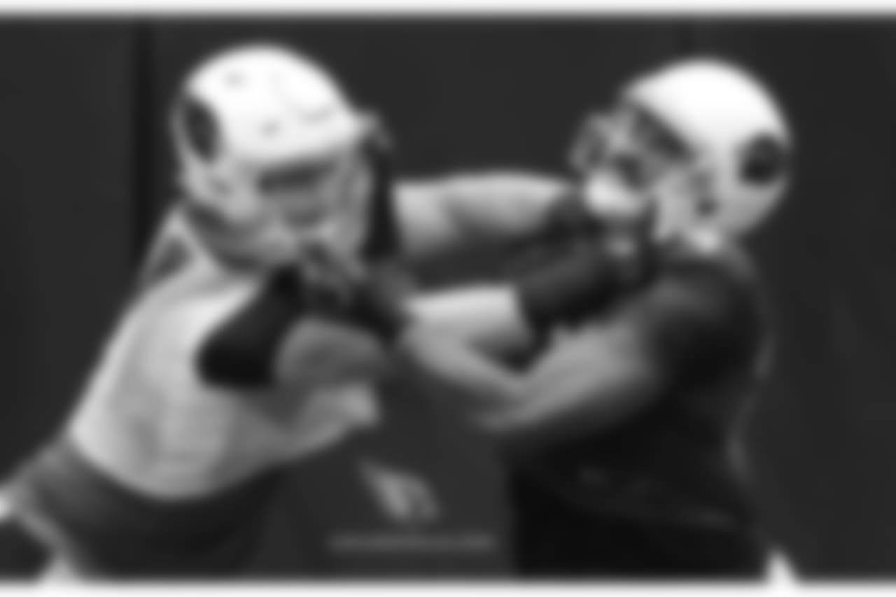 Day 12: DT Josh Mauro (left) battles with TE Jermaine Gresham (right)