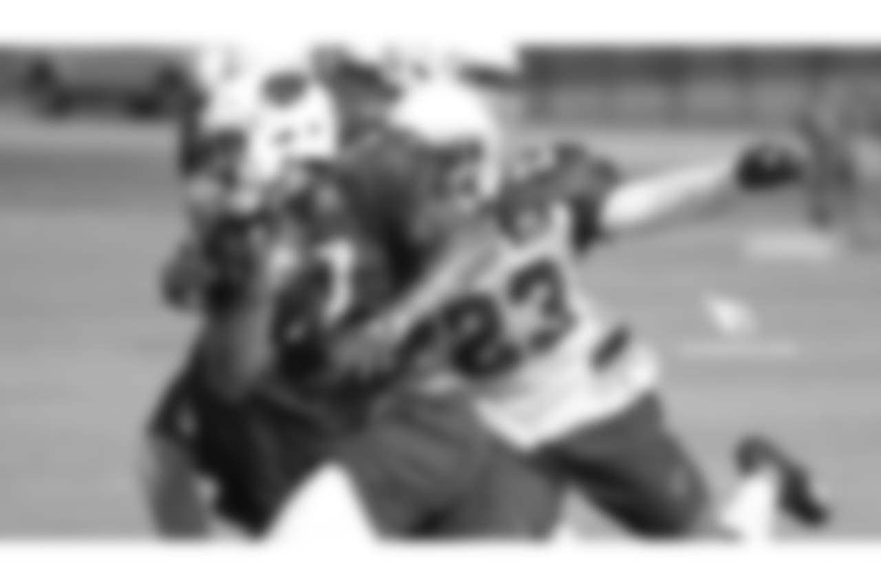 RB D.J. Foster is pursued by CB Bene Benwikere