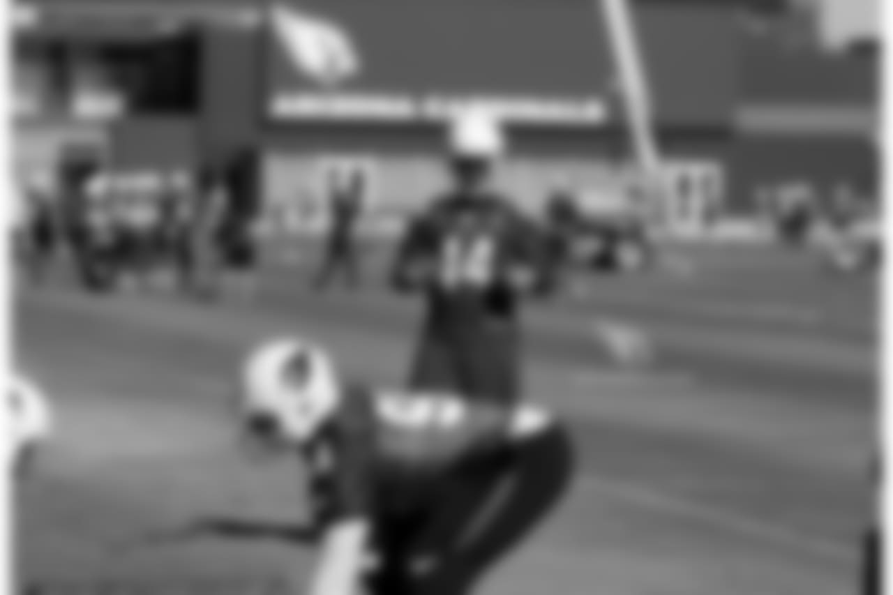 LB Markus Golden watches a drill