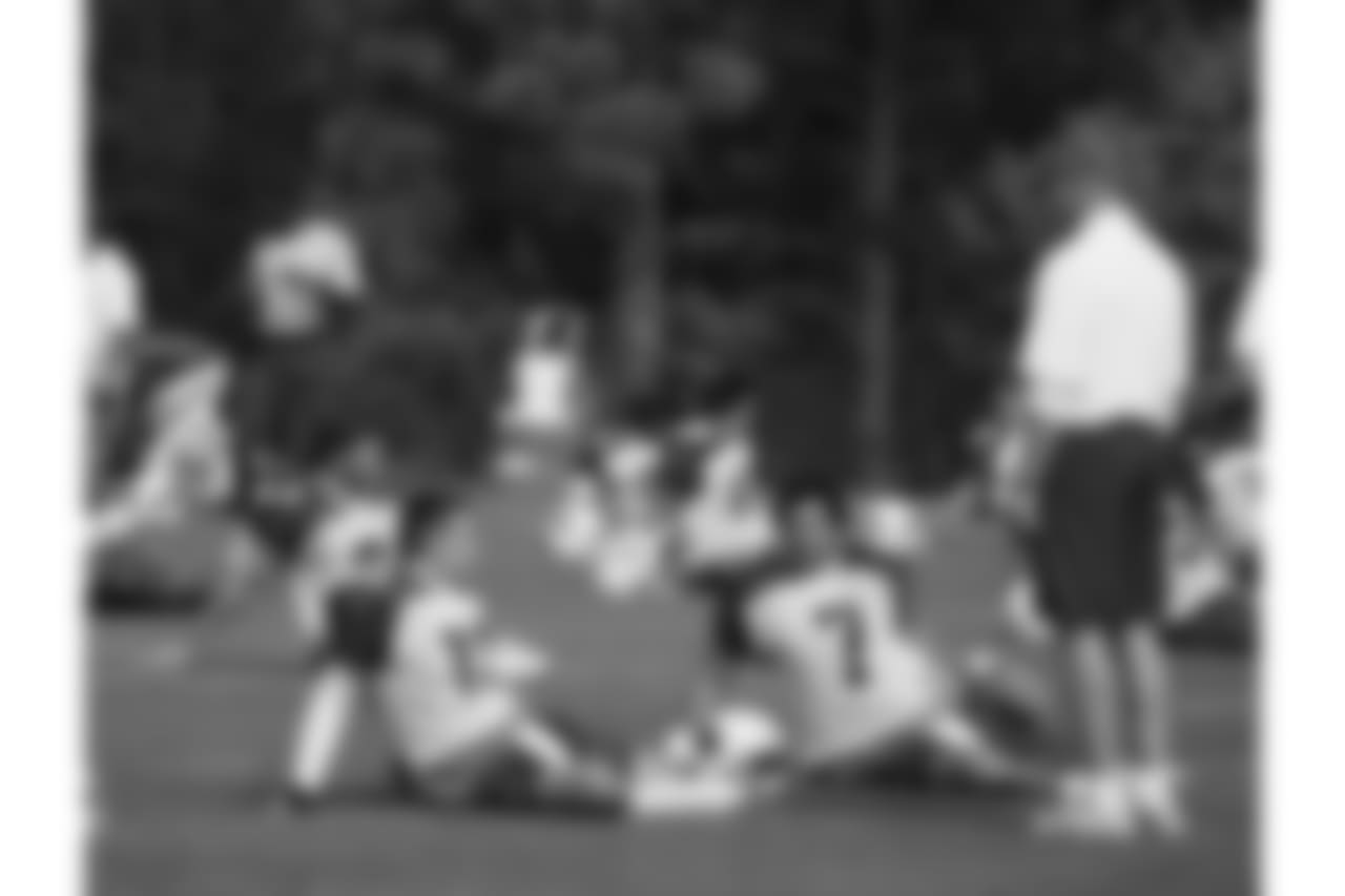With Matt Leinart and coach Ken Whisenhunt in training camp, 2009
