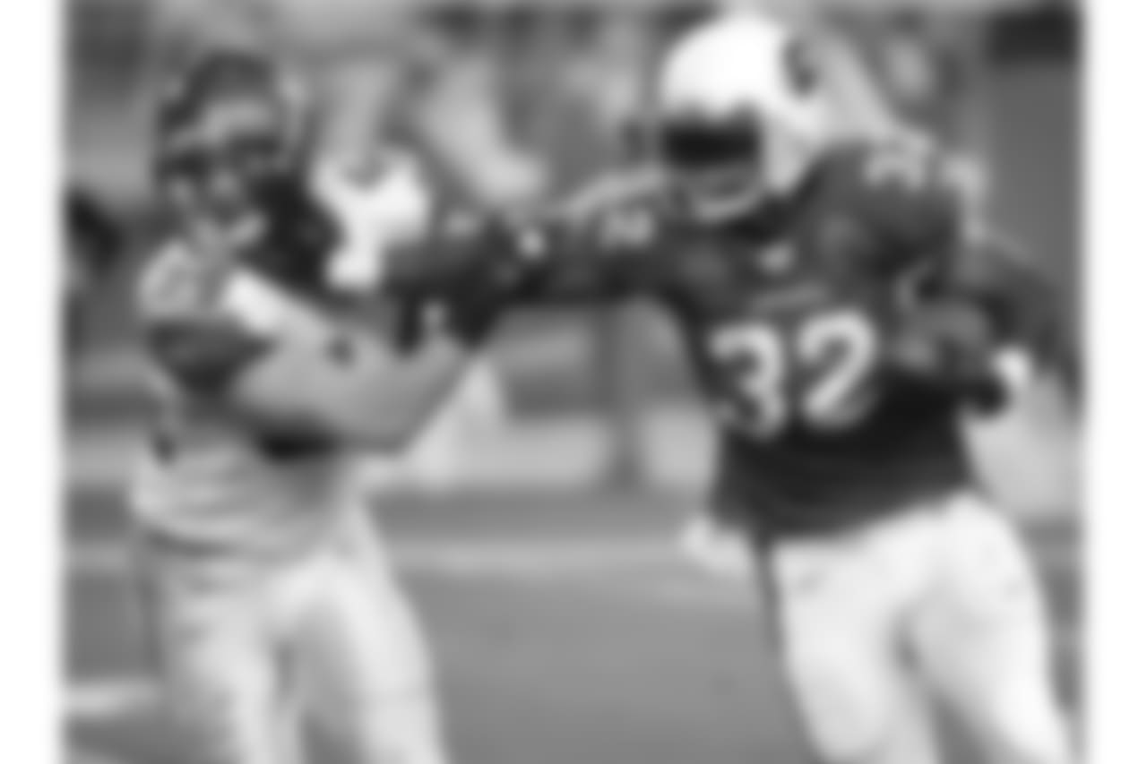 2008: RB Edgerrin James stiff-arms Seattle's Will Herring