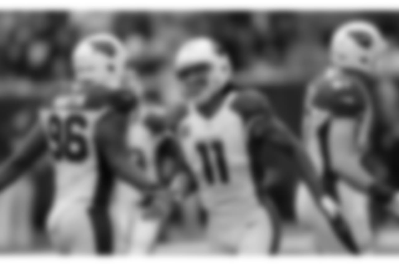WR Larry Fitzgerald is congratulated after his touchdown reception