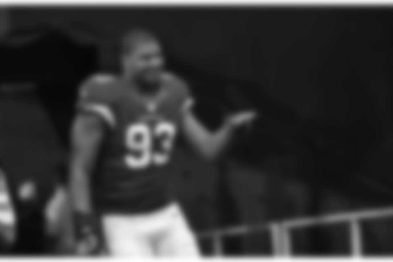 DT Calais Campbell walking onto the field before the 2016 opener