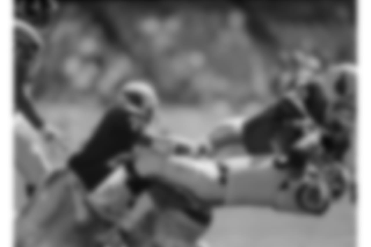 1994: LB Eric Hill brings down Rams RB Jerome Bettis