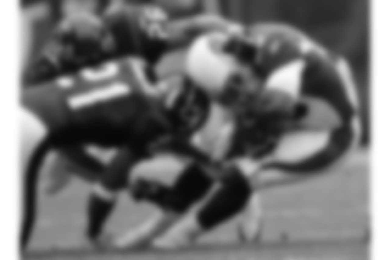 2005: RB J.J. Arrington fights for yardage