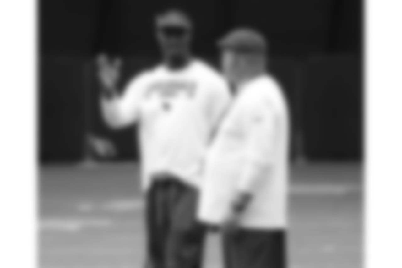Coaching intern Plaxico Burress and coach Bruce Arians