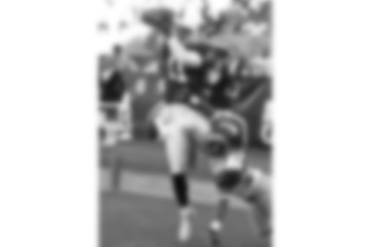 2004: WR Larry Fitzgerald hauls in a touchdown