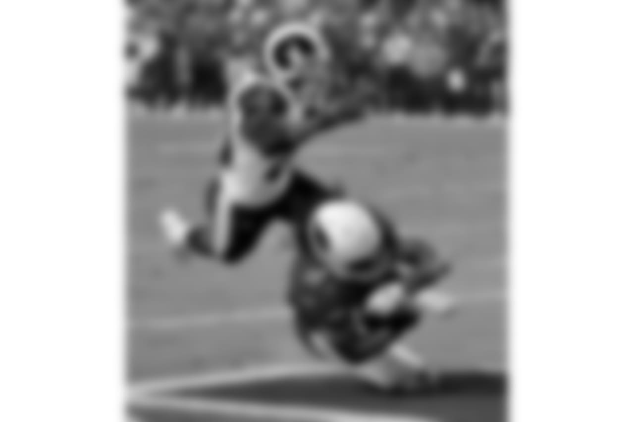 WR Larry Fitzgerald falls into the endzone for a touchdown