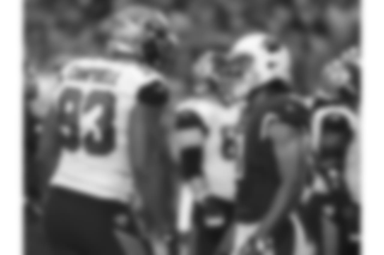 Jaguars DE Calais Campbell (left) and Cardinals WR Larry Fitzgerald (right)