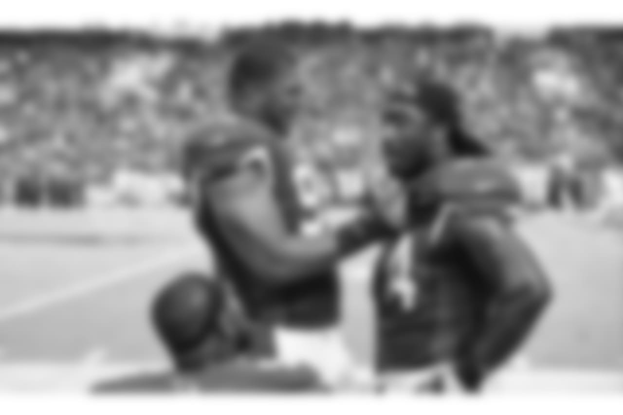 Campbell with Markus Golden