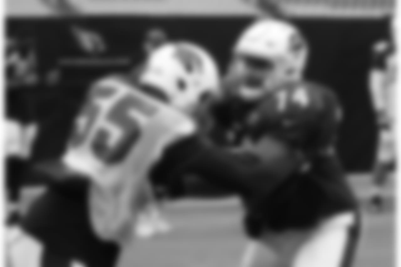 Day 3: T D.J. Humphries (right) takes on LB Chandler Jones (left)