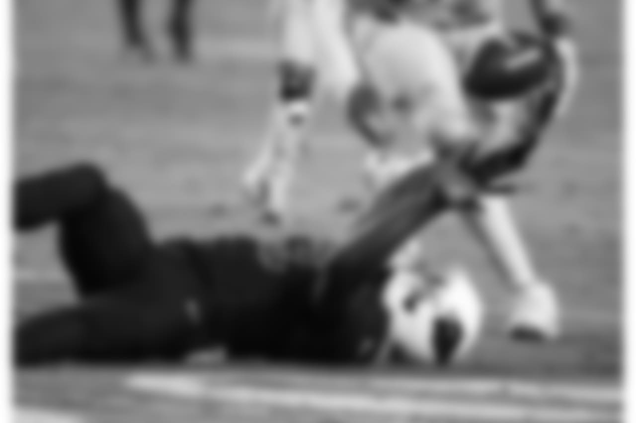 WR Jaron Brown bobbles the ball