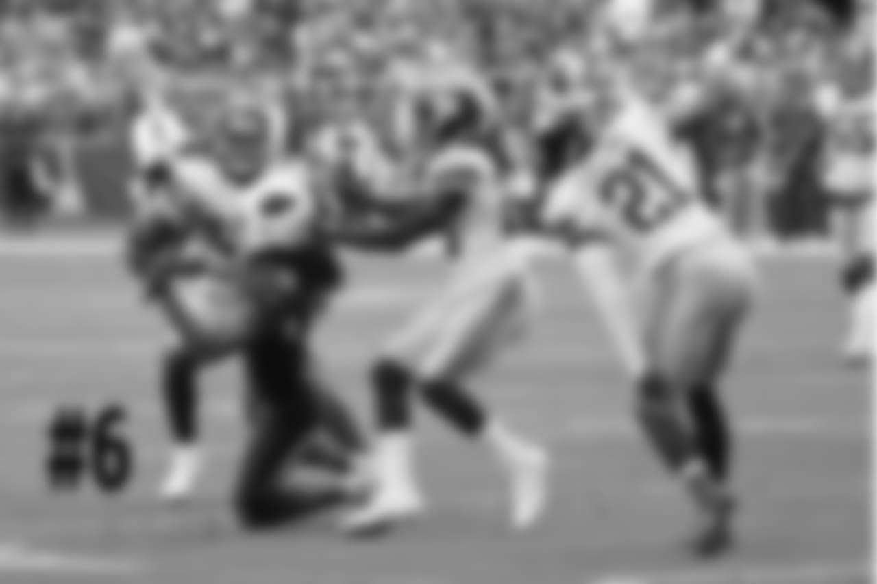 WR Larry Fitzgerald hauls in a flea flicker pass