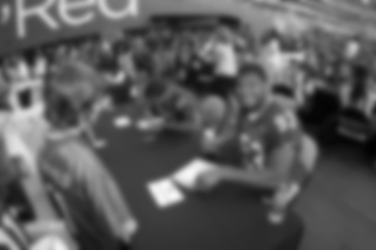 Signing autographs for the fans