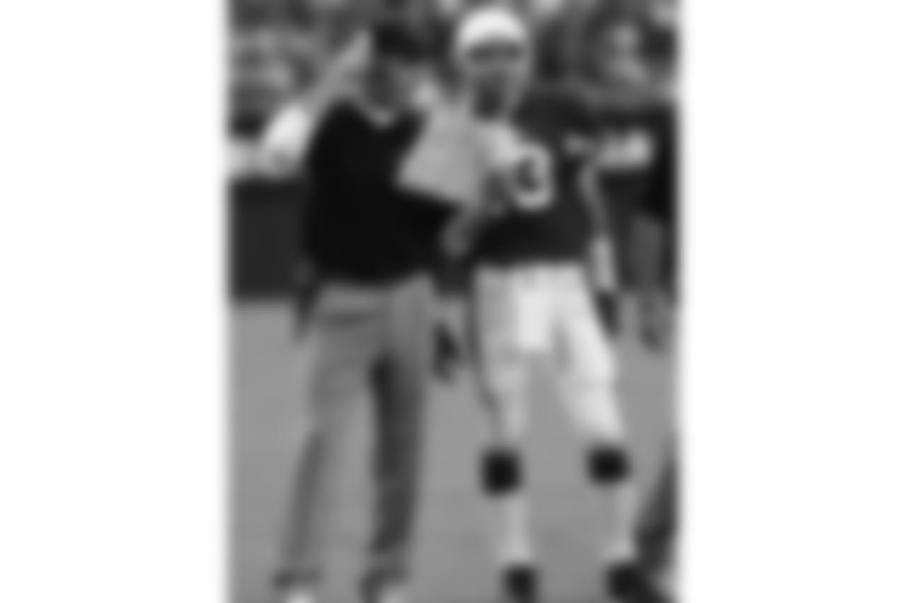 Warner with former coach Ken Whisenhunt