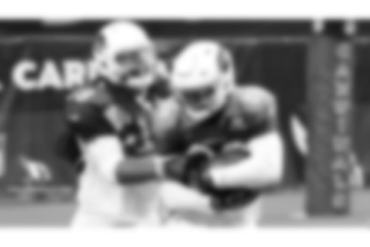 S Tre Boston (left) wraps up TE Ricky Seals-Jones