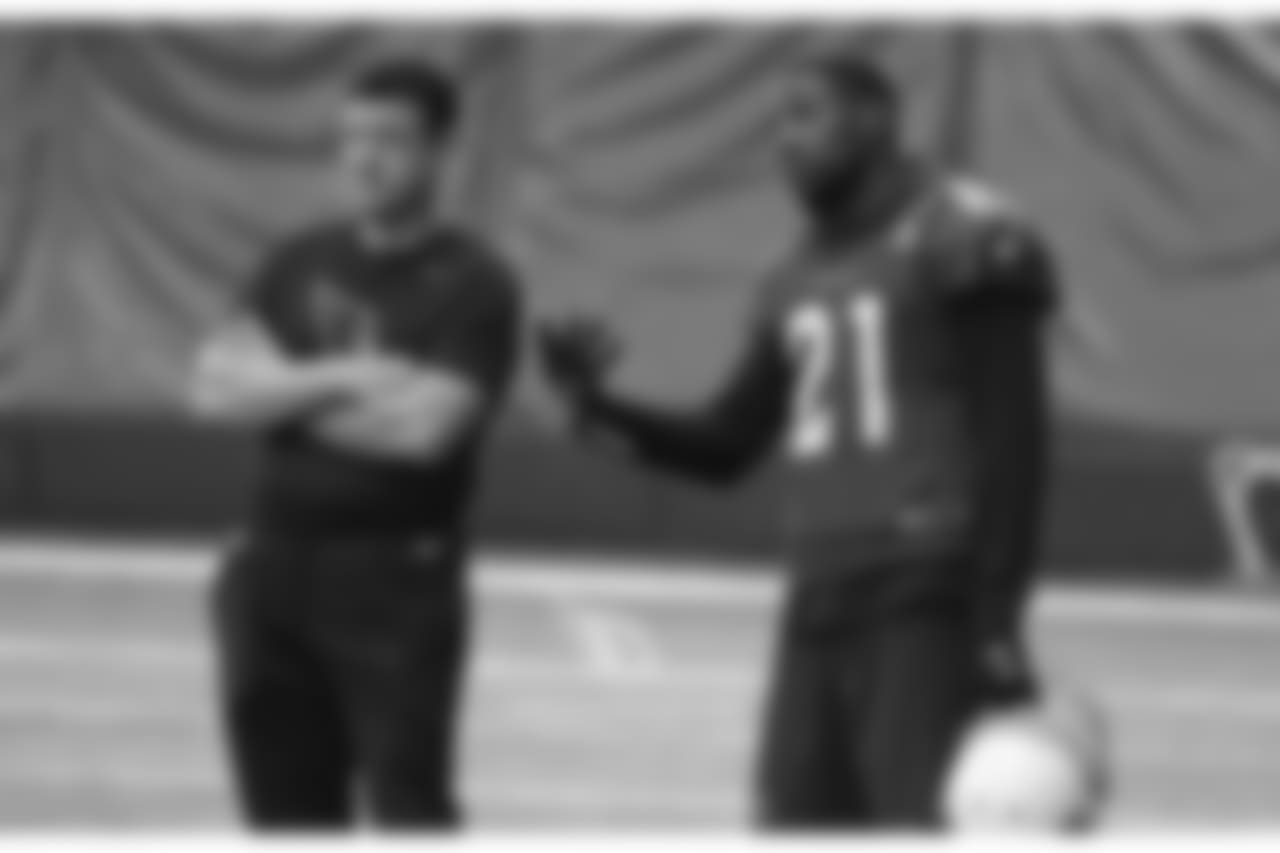 CB Patrick Peterson talks with defensive backs coach Nick Rapone