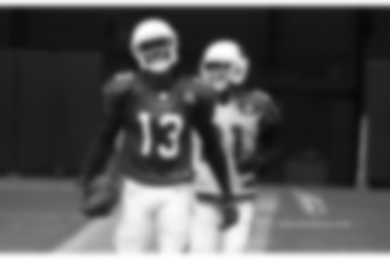 WR Jaron Brown and CB Patrick Peterson have a chuckle