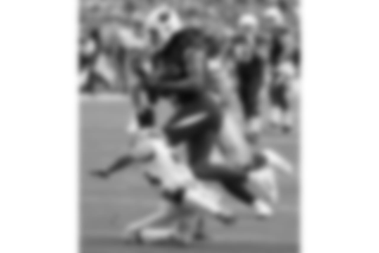 Larry Fitzgerald runs for extra yardage after the catch