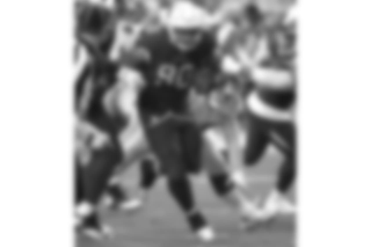 Cardinals DL Robert Nkemdiche scoops up a Giants fumble