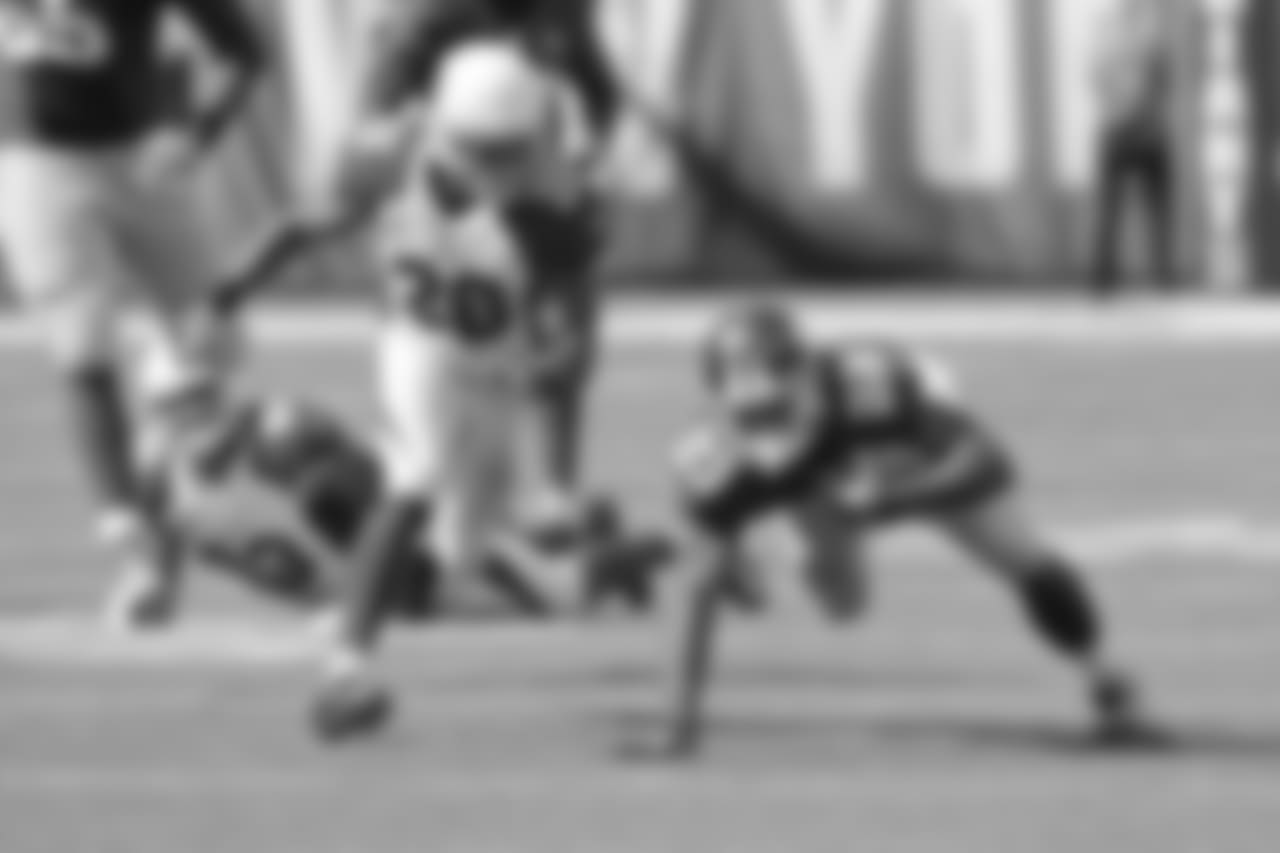 2014: S Rashad Johnson closes in on Giants RB Rashad Jennings