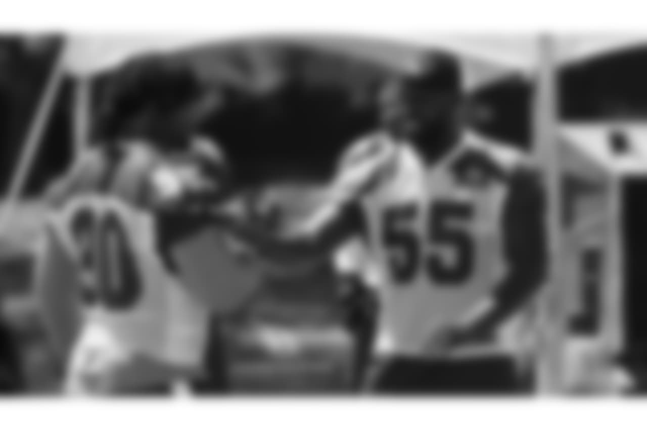 Defensive linemen Robert Nkemdiche (90) and Chandler Jones