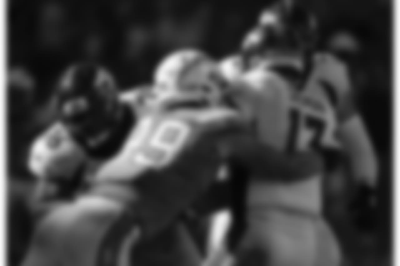 Los Angeles Chargers defensive end Joey Bosa, left, sacks Denver Broncos quarterback Trevor Siemian during the second half of an NFL football game Sunday, Oct. 22, 2017, in Carson, Calif. (AP Photo/Jae C. Hong)