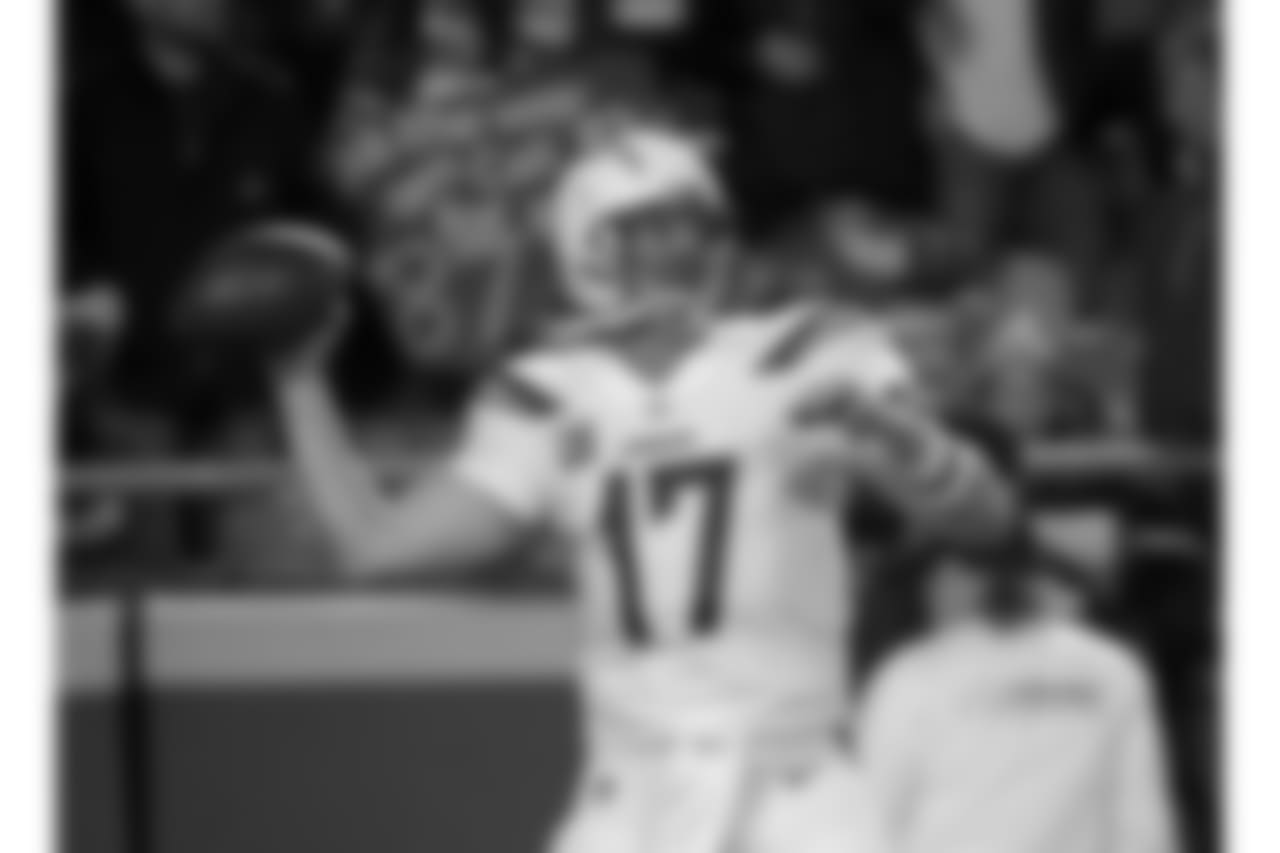 Los Angeles Chargers quarterback Philip Rivers (17) warms up before an NFL football game against the Kansas City Chiefs in Kansas City, Mo., Saturday, Dec. 16, 2017. (AP Photo/Charlie Riedel)